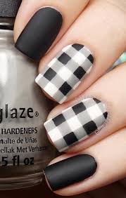Nail art and nail designs can quite often be vivid, bold and in your face. Black And White Check Design Nail Art
