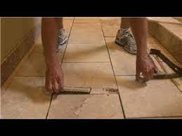 remove old ceramic tile in bathrooms