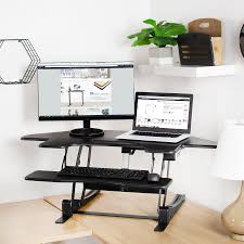 I have a corner standing to sitting desk with everything. Vivo Corner Electric Cubicle Sit Height Adjustable Corner Standing Desk Converter Wayfair