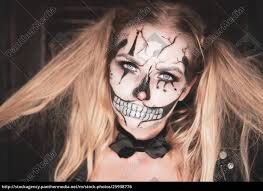 woman with clown skull halloween makeup