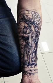 Tatuajes de ángel para hombres. 61 Magnetic Angel Tattoo For Arm