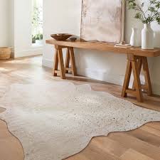 clayton faux cowhide area rug style