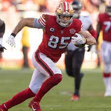 49ers' George Kittle gives gloves to ...