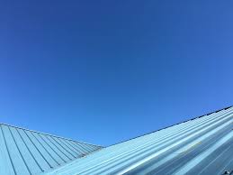 metal roof over a shingle roof