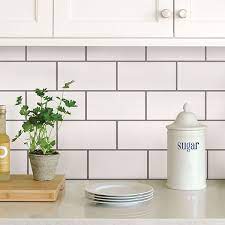 Install new ceramic, porcelain, glass or stone tiles above a countertop to brighten a kitchen or bath. Nh2363 Subway Peel And Stick Backsplash Tiles By In Home