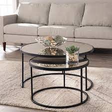When you need some table surface space to place drinks and snacks on during film nights or when guests are around, nest tables are ideal. Downham 2 Piece Coffee Table Set Nesting Coffee Tables Coffee Table Round Coffee Table Sets