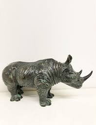 solid bronze rhino sculpture wild