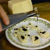 How do Italians eat Parmesan cheese?