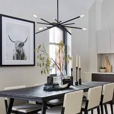 Three tiers of candle lights, an intricately designed frame, and an expertly applied black finish make this. Best Dining Room Light Fixtures And Chandeliers Under 200 Hgtv