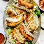 baja fish tacos with baja white sauce