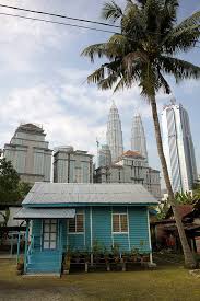 Kampung baru is rich, beautiful, and has huge… tracts of land (to paraphrase monty python). A Malay Village In Central Kuala Lumpur Peeking Duck
