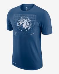 Above them is the team's woodmark. Minnesota Timberwolves Logo Grid Men S Nike Dri Fit Nba T Shirt Nike Com