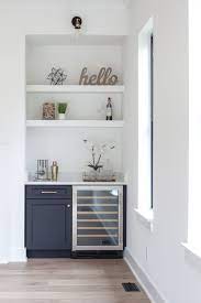 The dry bar cabinets in this collection come in different finishes, but they are all neutral and easy to coordinate with your space. Dry Bar In Living Room With Custom Cabinet And Wine Fridge Floating Shelves Interiordesignidea Living Room Bar Recessed Shelves Living Room Dining Room Small