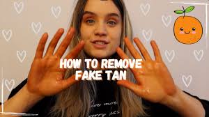 remove fake tan off hands