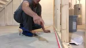 installing carpet strips on concrete