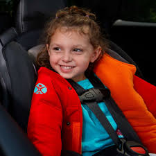 kids wearing coats in car seats