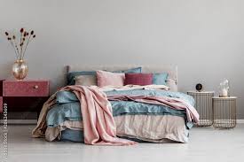 Pastel Pink Beige And Blue Bedding On