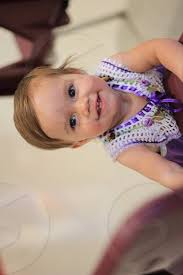 baby brown eyes purple dress