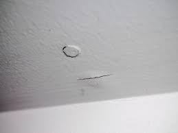 nail pops in ceiling after new roof