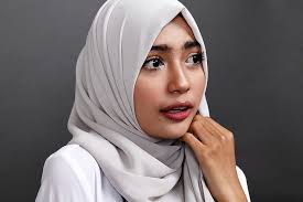 woman wearing white hijab veil