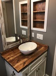 It features two metal sinks and a practical construction with six shelves and lower compartments with double wooden doors and. Diy Rustic Wood Countertop And Vessel Sink Bathroom Makeover Bathroom Rustic Bathroom Farmhouse Style Rustic Bathroom Vanities Bathroom Countertops Diy