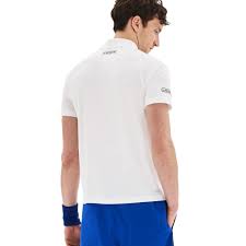 Lacoste's collection is designed to keep cool under the heated pressure of a major match. Lacoste Men S Novak Djokovic Graphic Print Tech Jersey Polo White St Merchant Of Tennis