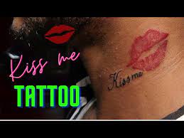 kiss me lips tattoo on neck by