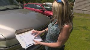 woman warns others about car wrap scam