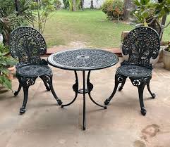 Cast Iron Table And Chairs In