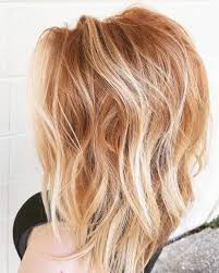Beach blonde highlights are sprinkled lightly throughout the top portion of the hair in this easy hairstyle. 50 Of The Most Trendy Strawberry Blonde Hair Colors For 2020