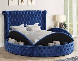 round blue velvet tufted bed with storage