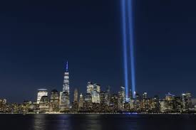 tribute in light rises from twin towers