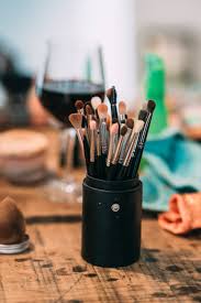 makeup brushes on table free stock photo