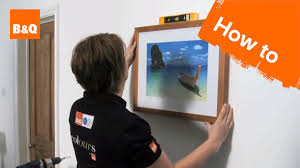 how to hang a picture you