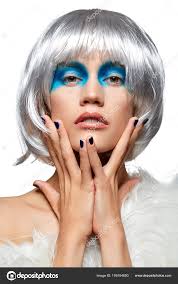 silver wig with blue makeup stock photo
