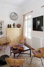 round wicker chairs around low table in