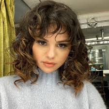 Especially if you've been binging friends on netflix. Selena Gomez S Curly Hair Bangs Is The Look Of 2020