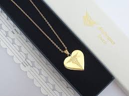 las gold heart sos necklace pendant