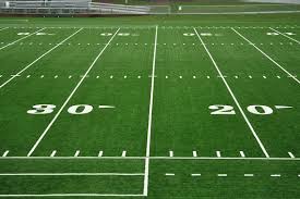 football field with sideline covers