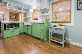 If wood and stone kitchen flooring aren't for you and kitchen floor tiles aren't your thing, then how about something a little bolder and more colorful, and more affordable? Kitchen Floor Design Ideas Diy