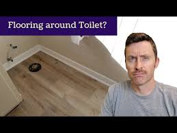 cut flooring around a toilet