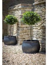 Common plant pot materials include metal this can simply be put in the larger pot without replanting. Search Results Large Garden Pots Large Outdoor Planters Outdoor Planters