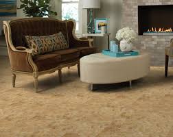 Inspiration for a transitional enclosed medium tone wood floor and brown floor living room remodel in kansas city with white. Empire Family Room Flooring Ideas Options Empire Today