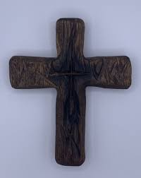 hand carved old rugged wooden cross
