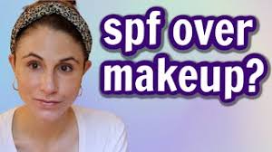applying sunscreen over makeup dr dray
