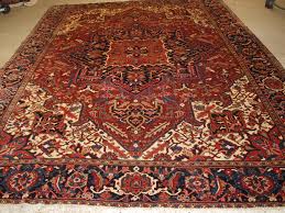 antique persian heriz carpet with a