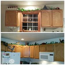 Occasionally, it's left open but where's the fun in that? Decorating Above Kitchen Cabinets Ideas Tips