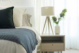 should nightstands be taller than the bed
