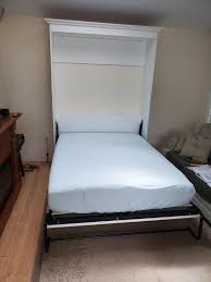 versatile full murphy bed with shelving