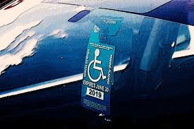 handicapped placard in another car